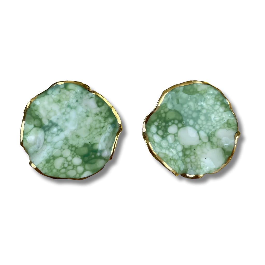 Pair of green marbled earrings with gold edges on a white background