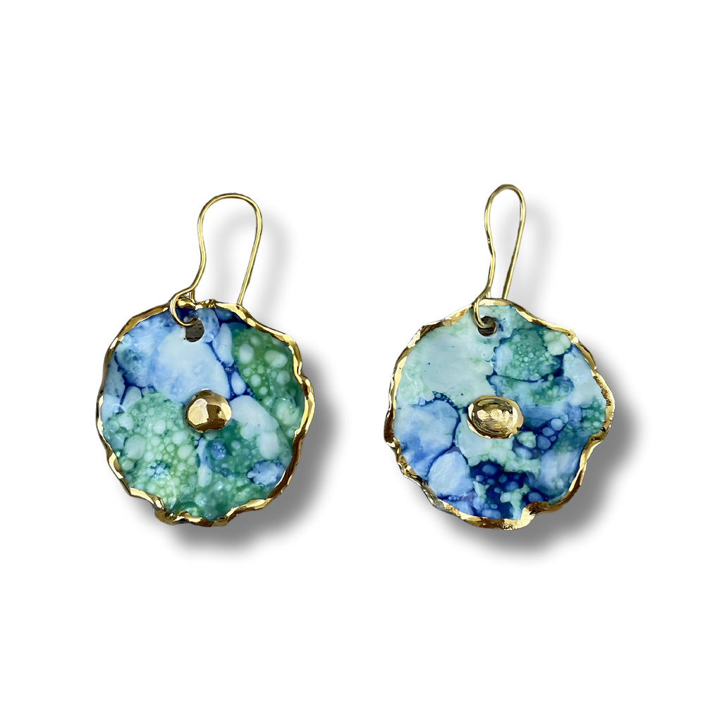 Pair of earrings with a blue and green design on a white background.