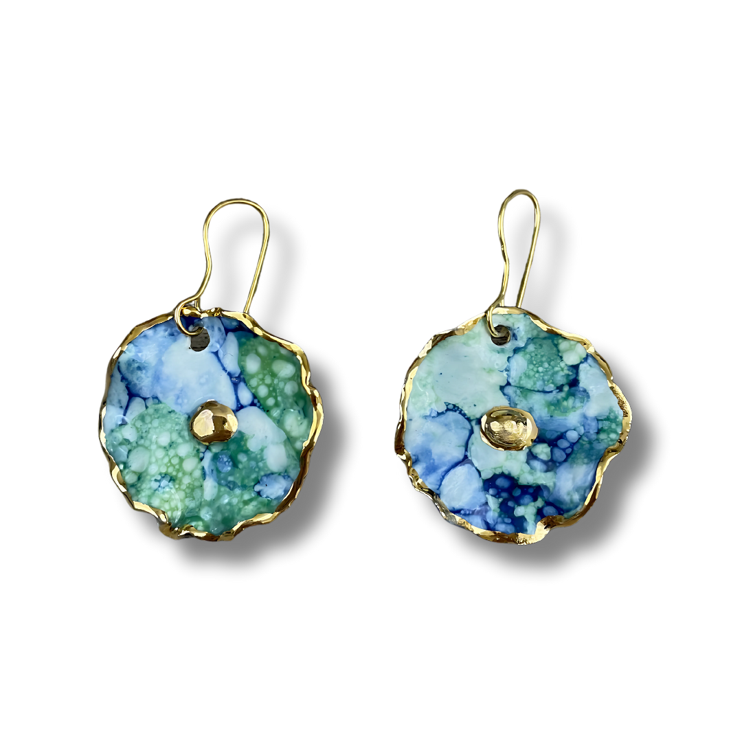 Pair of earrings with a blue and green design on a white background.
