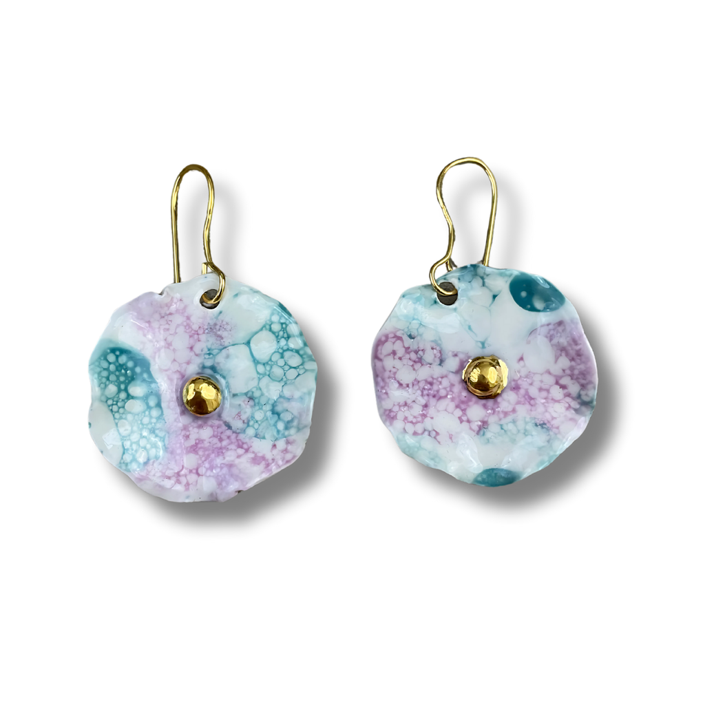 Pair of turquoise and purple flower-shaped earrings with gold accents on a white background