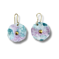 Pair of turquoise and purple flower-shaped earrings with gold accents on a white background