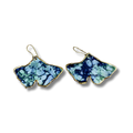 Pair of ginkgo-shaped earrings with a blue and green pattern on a white background